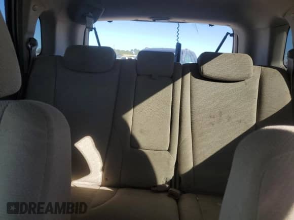 2005 Hyundai Tucson GL z VIN KM8JM12BX5U168799, wystawiony jako Copart lot #84709184 z przebiegiem 127 109 mil mil oraz Szkoda całkowita • Salvage title. Historia ofert i sprzedaży dostępna na DreamBid. Obrazek 10.