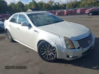 ✅ 2013 Cadillac CTS Luxury • VIN: 1G6DG5E57D0163994 • Lot: 43376631. Listed on IAAI with 132,088 mi. Free auction sales archive from the USA and detailed vehicle history report at DreamBid. Image 1.