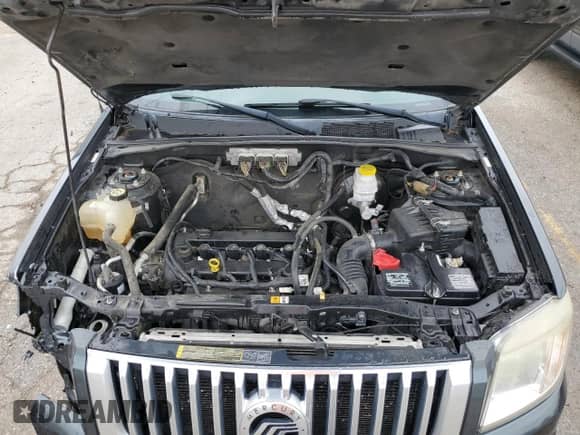 2009 Mercury Mariner Premier with VIN 4M2CU877X9KJ17955, listed as a Copart auction lot 56878845 with 165,626 mi miles and Salvage title. Bid and sale history available at DreamBid. Image 12.