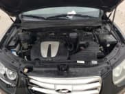 ✅ 2012 Hyundai Santa Fe Limited • VIN: 5XYZK4AG6CG110778 • Lot: 69934314. Listed on Copart with 172,850 mi. Free auction sales archive from the USA and detailed vehicle history report at DreamBid. Image 13.