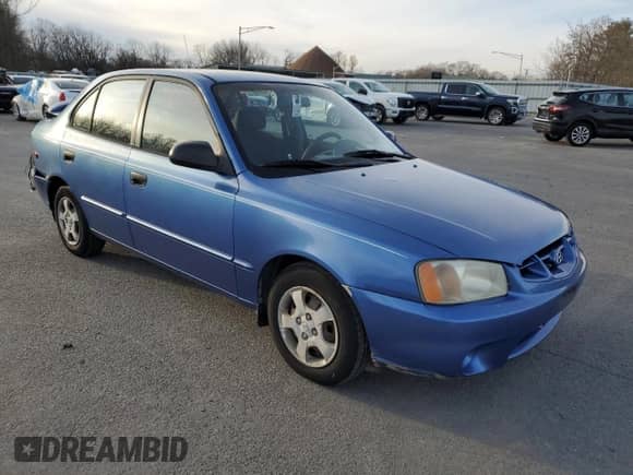 2001 Hyundai Accent GL with VIN KMHCG45C11U193879, listed as a Copart auction lot 37525334 with 150,951 mi miles and Salvage title. Bid and sale history available at DreamBid. Image 4.