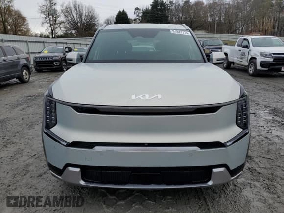 ✅ 2024 Kia EV9 Land • VIN: KNDADFS52R6036450 • Lot: 84941774. Wystawiony na Copart z przebiegiem 1 320 mil. Bezpłatny archiwum sprzedaży aukcyjnych z USA i szczegółowy raport historii pojazdu na DreamBid. Zdjęcie 5.