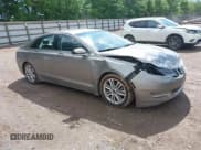 ✅ 2016 Lincoln MKZ Hybrid • VIN: 3LN6L2LU4GR630976 • Lot: 42160730. Wystawiony na IAAI z przebiegiem 244 723 mil. Bezpłatny archiwum sprzedaży aukcyjnych z USA i szczegółowy raport historii pojazdu na DreamBid. Zdjęcie 1.