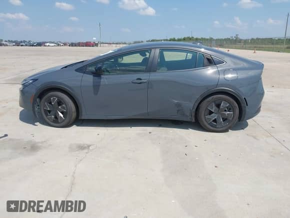 2024 Toyota Prius LE with VIN JTDACAAUXR3032131, listed as a IAAI auction lot 43231631 with 15,535 mi miles and . Bid and sale history available at DreamBid. Image 14.