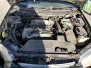 ✅ 2000 Mazda Protege DX • VIN: JM1BJ2220Y0239835 • Lot: 80228864. Wystawiony na Copart z przebiegiem 200 936 mil. Bezpłatny archiwum sprzedaży aukcyjnych z USA i szczegółowy raport historii pojazdu na DreamBid. Zdjęcie 11.