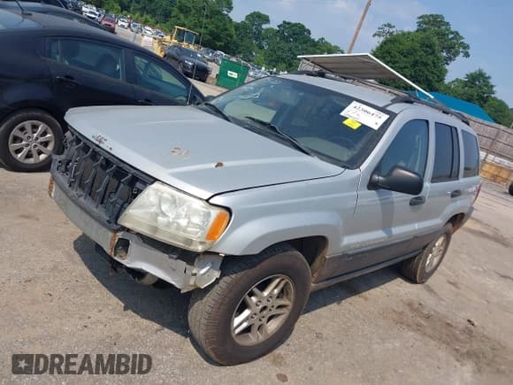 ✅ 2004 Jeep Grand Cherokee Laredo • VIN: 1J4GX48S74C165095 • Lot: 42306475. Listed on IAAI with 238,560 mi. Free auction sales archive from the USA and detailed vehicle history report at DreamBid. Image 2.