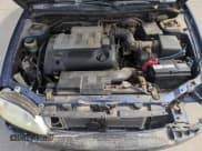 ✅ 2002 Kia Spectra • VIN: KNAFB121025197433 • Lot: 51838015. Listed on Copart with 209,660 mi. Free auction sales archive from the USA and detailed vehicle history report at DreamBid. Image 11.