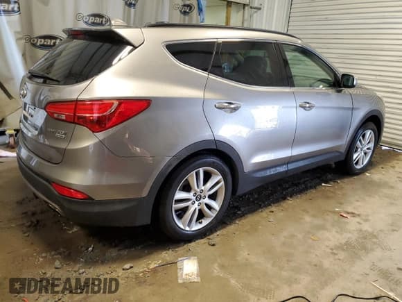 ✅ 2016 Hyundai Santa Fe • VIN: 5XYZW4LA2GG372073 • Лот: 39466403. Опубликован ранее на Copart с пробегом 98 803 миль. Бесплатный доступ к архиву аукционных продаж из США и подробный отчёт об истории автомобиля на DreamBid. Изображение 3.