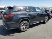 ✅ 2018 Lexus RX 450hL Premium • VIN: JTJDGKCAXJ2000538 • Lot: 61776195. Listed on Copart with 74,988 mi. Free auction sales archive from the USA and detailed vehicle history report at DreamBid. Image 3.