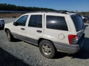 ✅ 2002 Jeep Grand Cherokee Laredo • VIN: 1J4GW48N62C119509 • Lot: 50392685. Listed on Copart with 194,894 mi. Free auction sales archive from the USA and detailed vehicle history report at DreamBid. Image 2.