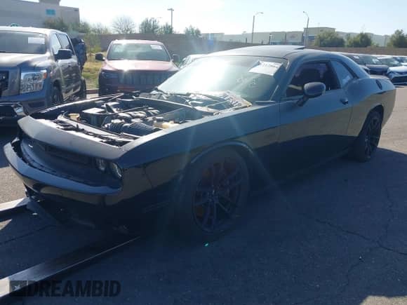 2018 Dodge Challenger T/A 392 with VIN 2C3CDZFJ1JH154627, listed as a IAAI auction lot 41212864 with 61,453 mi miles and . Bid and sale history available at DreamBid. Image 2.