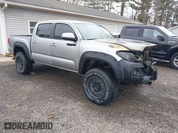 ✅ 2016 Toyota Tacoma SR • VIN: 5TFCZ5AN2GX012937 • Lot: 41963728. Listed on IAAI with 157,397 mi. Free auction sales archive from the USA and detailed vehicle history report at DreamBid. Image 1.