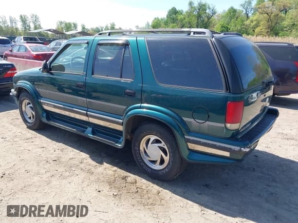 ✅ 1997 Chevrolet Blazer LS • VIN: 1GNDT13WXV2175468 • Lot: 42081531. Wystawiony na IAAI z przebiegiem 148 858 mil. Bezpłatny archiwum sprzedaży aukcyjnych z USA i szczegółowy raport historii pojazdu na DreamBid. Zdjęcie 3.