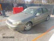 ✅ 2003 Saturn LS • VIN: 1G8JU54FX3Y556207 • Lot: 43731223. Listed on IAAI with 129,019 mi. Free auction sales archive from the USA and detailed vehicle history report at DreamBid. Image 2.