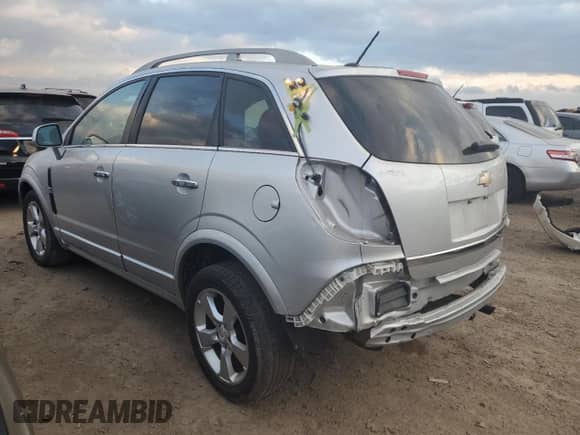 2015 Chevrolet Captiva Sport LT z VIN 3GNAL3EK9FS503168, wystawiony jako Copart lot #82699684 z przebiegiem 127 599 mil mil oraz Szkoda całkowita • Salvage title. Historia ofert i sprzedaży dostępna na DreamBid. Obrazek 2.