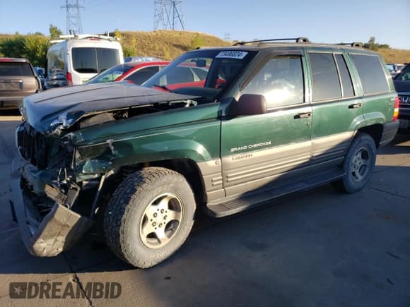 ✅ 1997 Jeep Grand Cherokee Laredo • VIN: 1J4GZ58Y6VC647434 • Lot: 73496824. Listed on Copart with 124,946 mi. Free auction sales archive from the USA and detailed vehicle history report at DreamBid. Image 1.