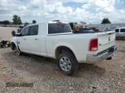 ✅ 2015 Ram 2500 Laramie • VIN: 3C6UR5NL4FG569422 • Lot: 62017655. Listed on Copart with 100,400 mi. Free auction sales archive from the USA and detailed vehicle history report at DreamBid. Image 2.