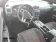 2014 Dodge Challenger SXT 100th Anniversary z VIN 2C3CDYAG1EH278828, wystawiony jako Copart lot #58417075 z przebiegiem 136 953 mil mil oraz Szkoda całkowita • Salvage title. Historia ofert i sprzedaży dostępna na DreamBid. Obrazek 8.