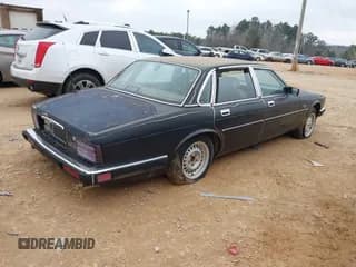 ✅ 1989 Jaguar XJ • VIN: SAJHY1545KC588624 • Лот: 41406797. Опубликован ранее на IAAI с пробегом Не указан. Бесплатный доступ к архиву аукционных продаж из США и подробный отчёт об истории автомобиля на DreamBid. Изображение 4.