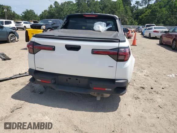 2022 Hyundai Santa Cruz SEL с VIN 5NTJBDAE3NH031402, выставлен на аукционе Copart как лот 59887415 с пробегом 48 156 миль миль и Списание • Salvage title. История ставок и продаж доступна на DreamBid. Изображение 6.