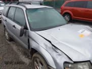 ✅ 2004 Subaru Forester XS • VIN: JF1SG65604H721338 • Lot: 43562108. Listed on IAAI with 194,707 mi. Free auction sales archive from the USA and detailed vehicle history report at DreamBid. Image 6.