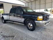 ✅ 1999 Ford F-350 XL • VIN: 1FTWW32F3XEA30151 • Lot: 68697795. Listed on Copart with 238,275 mi. Free auction sales archive from the USA and detailed vehicle history report at DreamBid. Image 4.