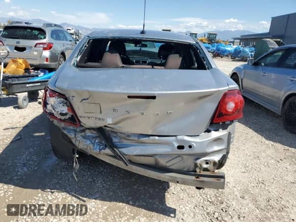 2013 Dodge Avenger SE с VIN 1C3CDZAB0DN534165, выставлен на аукционе Copart как лот 72033184 с пробегом 151 602 миль миль и Списание • Salvage title. История ставок и продаж доступна на DreamBid. Изображение 6.