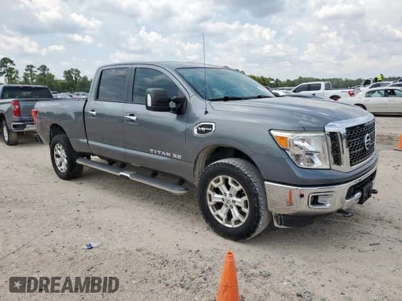 ✅ 2017 Nissan Titan SV • VIN: 1N6AA1F25HN544618 • Лот: 69580255. Опубликован ранее на Copart с пробегом 100 512 миль. Бесплатный доступ к архиву аукционных продаж из США и подробный отчёт об истории автомобиля на DreamBid. Изображение 4.