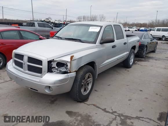 2007 Dodge Dakota SLT with VIN 1D7HW48K77S129162, listed as a IAAI auction lot 41842077 with 186,172 mi miles and . Bid and sale history available at DreamBid. Image 2.