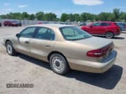 ✅ 1996 Lincoln Continental • VIN: 1LNLM97V0TY642100 • Lot: 42425141. Listed on IAAI with 174,277 mi. Free auction sales archive from the USA and detailed vehicle history report at DreamBid. Image 3.