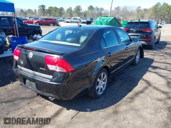 ✅ 2011 Mercury Milan Premier • VIN: 3MEHM0JG8BR603346 • Lot: 41958444. Listed on IAAI with 124,860 mi. Free auction sales archive from the USA and detailed vehicle history report at DreamBid. Image 4.