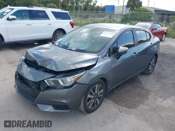 ✅ 2020 Nissan Versa SV • VIN: 3N1CN8EV4LL821842 • Lot: 43232553. Listed on IAAI with 86,042 mi. Free auction sales archive from the USA and detailed vehicle history report at DreamBid. Image 2.
