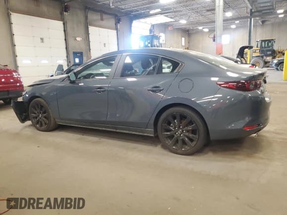 ✅ 2024 Mazda 3 S Carbon Edition • VIN: 3MZBPBCM8RM413399 • Лот: 85312995. Опубликован ранее на Copart с пробегом 9 844 миль. Бесплатный доступ к архиву аукционных продаж из США и подробный отчёт об истории автомобиля на DreamBid. Изображение 2.