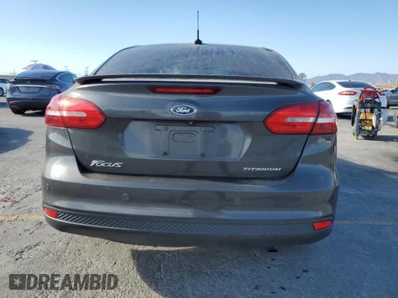 ✅ 2015 Ford Focus Titanium • VIN: 1FADP3J24FL387048 • Lot: 82431245. Listed on Copart with 124,984 mi. Free auction sales archive from the USA and detailed vehicle history report at DreamBid. Image 6.