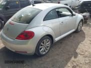 ✅ 2013 Volkswagen Beetle 2.0L TDI • VIN: 3VWJL7AT9DM630449 • Lot: 43198748. Listed on IAAI with 118,455 mi. Free auction sales archive from the USA and detailed vehicle history report at DreamBid. Image 4.