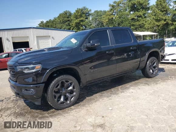 2023 Ram 1500 Limited с VIN 1C6SRFHT7PN540644, выставлен на аукционе Copart как лот 70766875 с пробегом 58 451 миль миль и Списание • Salvage title. История ставок и продаж доступна на DreamBid. Изображение 1.