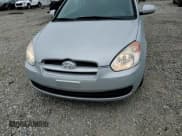 ✅ 2010 Hyundai Accent GS • VIN: KMHCM3AC2AU172158 • Лот: 50437045. Опубликован ранее на Copart с пробегом 117 391 миль. Бесплатный доступ к архиву аукционных продаж из США и подробный отчёт об истории автомобиля на DreamBid. Изображение 11.