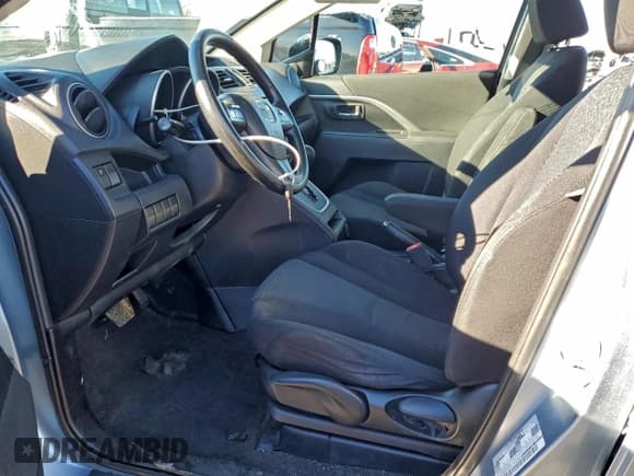 ✅ 2012 Mazda 5 Sport • VIN: JM1CW2BL9C0100875 • Lot: 94164865. Listed on Copart with 164,477 mi. Free auction sales archive from the USA and detailed vehicle history report at DreamBid. Image 7.