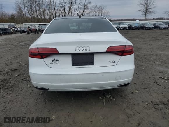 ✅ 2018 Audi A8 • VIN: WAU44AFD9JN000764 • Лот: 43721224. Опубликован ранее на Copart с пробегом 58 686 миль. Бесплатный доступ к архиву аукционных продаж из США и подробный отчёт об истории автомобиля на DreamBid. Изображение 6.