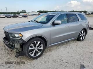 2014 Dodge Durango R/T z VIN 1C4SDHCT1EC353774, wystawiony jako Copart lot #70704705 z przebiegiem 177 029 mil mil oraz Szkoda całkowita • Salvage title. Historia ofert i sprzedaży dostępna na DreamBid. Obrazek 1.
