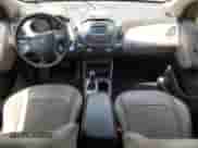 2014 Hyundai Tucson SE z VIN KM8JUCAG3EU813348, wystawiony jako Copart lot #61235045 z przebiegiem 77 597 mil mil oraz Szkoda całkowita • Salvage title. Historia ofert i sprzedaży dostępna na DreamBid. Obrazek 8.