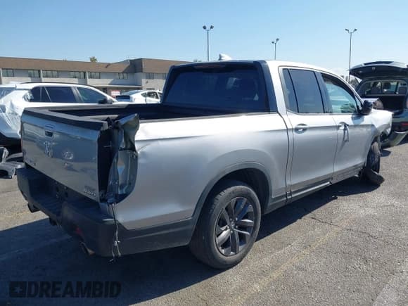 ✅ 2022 Honda Ridgeline Sport • VIN: 5FPYK3F16NB000566 • Lot: 43099564. Wystawiony na IAAI z przebiegiem Nie podano. Bezpłatny archiwum sprzedaży aukcyjnych z USA i szczegółowy raport historii pojazdu na DreamBid. Zdjęcie 4.
