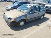 ✅ 1994 Geo Metro • VIN: 2C1MR2465R6726696 • Lot: 42053202. Listed on IAAI with 124,775 mi. Free auction sales archive from the USA and detailed vehicle history report at DreamBid. Image 2.