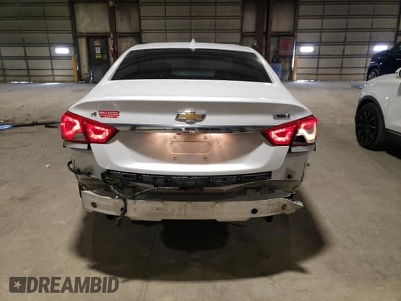 ✅ 2017 Chevrolet Impala Premier • VIN: 1G1145S36HU111839 • Лот: 57313094. Опубликован ранее на Copart с пробегом 84 068 миль. Бесплатный доступ к архиву аукционных продаж из США и подробный отчёт об истории автомобиля на DreamBid. Изображение 6.