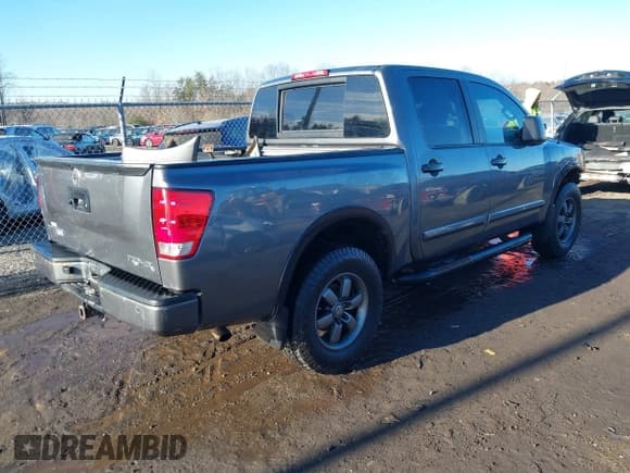 ✅ 2014 Nissan Titan SV • VIN: 1N6AA0EC0EN506620 • Lot: 41432210. Listed on IAAI with 333,218 mi. Free auction sales archive from the USA and detailed vehicle history report at DreamBid. Image 4.