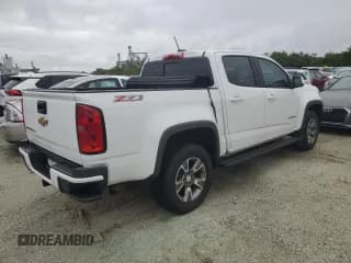✅ 2019 Chevrolet Colorado 2WD Z71 • VIN: 1GCGSDEN1K1110542 • Лот: 74142034. Опубликован ранее на Copart с пробегом Не указан. Бесплатный доступ к архиву аукционных продаж из США и подробный отчёт об истории автомобиля на DreamBid. Изображение 3.
