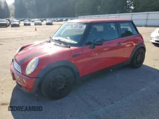 2003 MINI Hardtop with VIN WMWRC33453TC42218, listed as a Copart auction lot 82261725 with 125,395 mi miles and Salvage title. Bid and sale history available at DreamBid. Image 1.