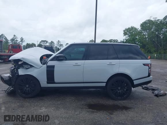 ✅ 2019 Land Rover Range Rover • VIN: SALGS2RE8KA541001 • Lot: 41989542. Listed on IAAI with 38,059 mi. Free auction sales archive from the USA and detailed vehicle history report at DreamBid. Image 14.