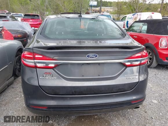 ✅ 2017 Ford Fusion Hybrid Titanium • VIN: 3FA6P0RU5HR301716 • Lot: 42017600. Listed on IAAI with 147,232 mi. Free auction sales archive from the USA and detailed vehicle history report at DreamBid. Image 16.