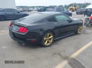 ✅ 2015 Ford Mustang V6 • VIN: 1FA6P8AM2F5328687 • Lot: 42999516. Listed on IAAI with 137,268 mi. Free auction sales archive from the USA and detailed vehicle history report at DreamBid. Image 4.